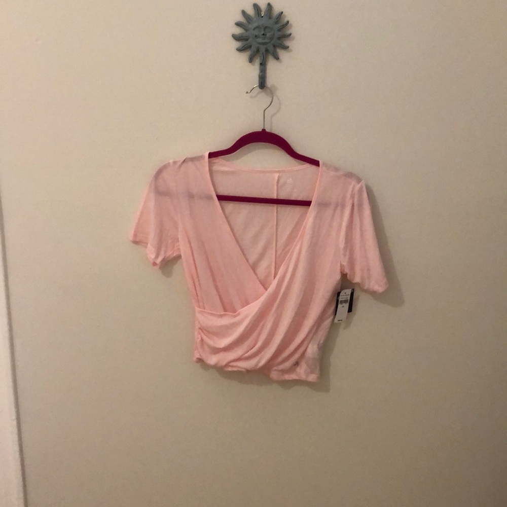 Baby pink activewear.